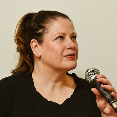 Photo of Nell Page singing