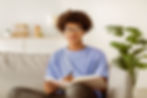 focused-black-teenager-writing-in-notebook-gettin-2025-02-11-19-14-14-utc.jpg