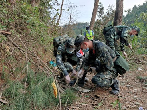 China plane crash: ‘Grim’ search as rescue teams comb hillside