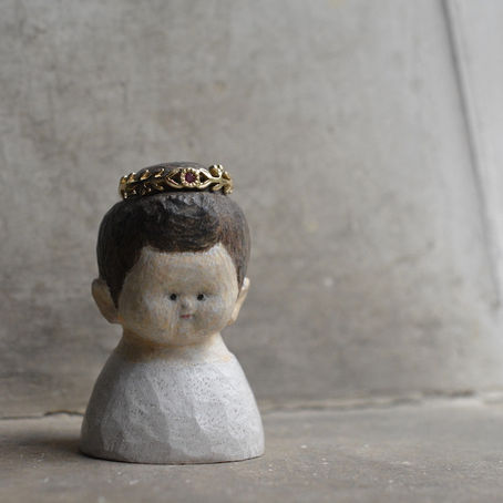 a girl and ruby in the olive ring