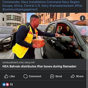 NSA Bahrain member distributing Iftar boxes in Ramadan