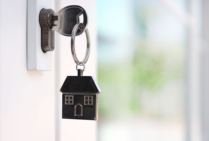 house-key-unlocking-new-house-is-plugged