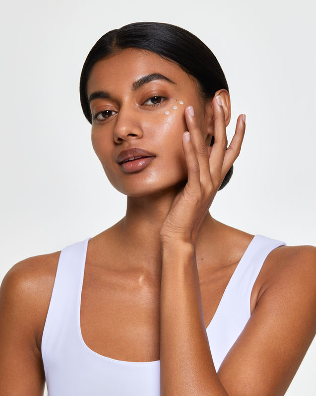 Olay beauty advertising campaign, model applying cream with finger, by Lauren Marsh