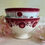 Thumbnail: Pair of red 1920s café au lait bowls