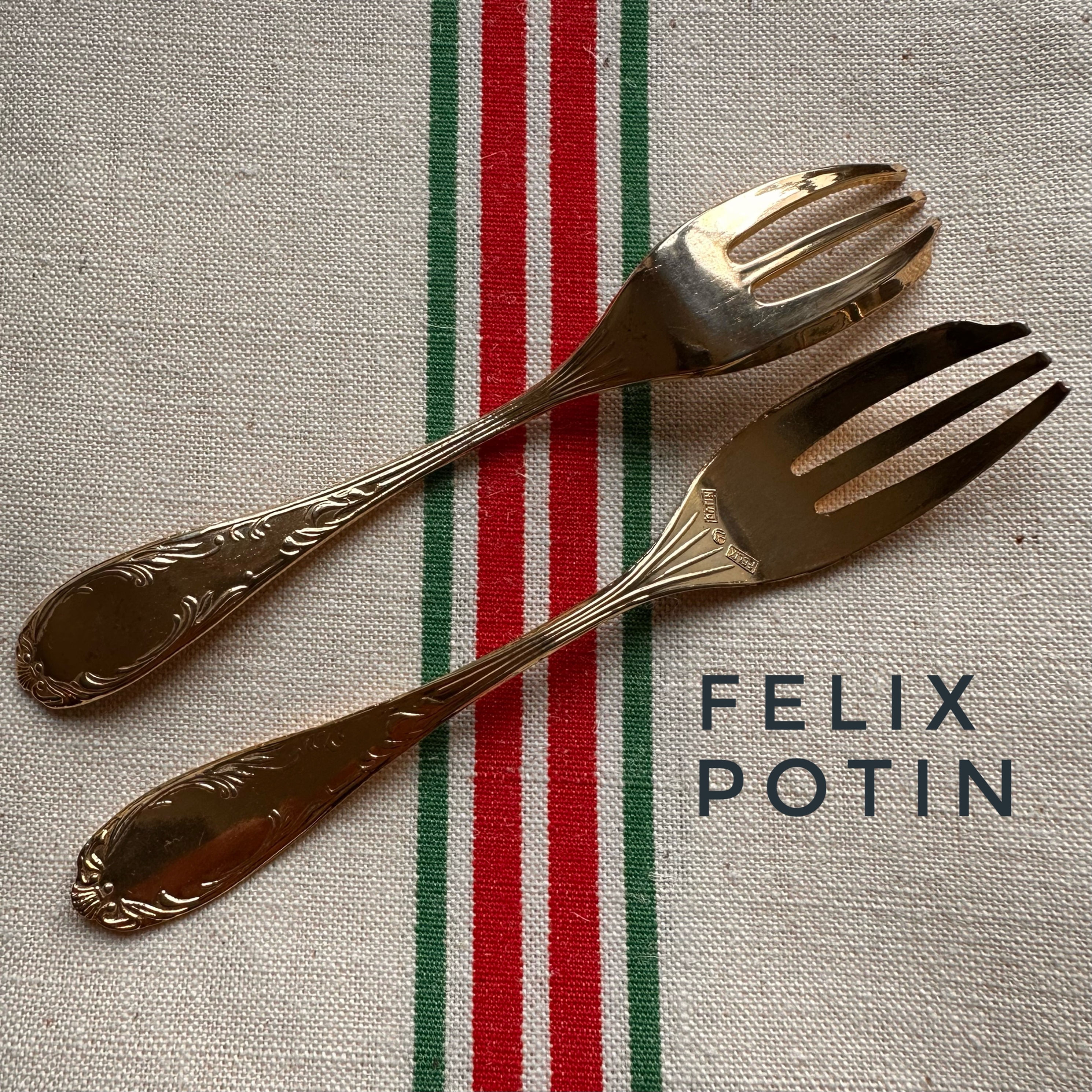 Pair of Felix Potin cake forks