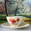 Thumbnail: Pair of Digoin Tulip cups and saucers and creamer