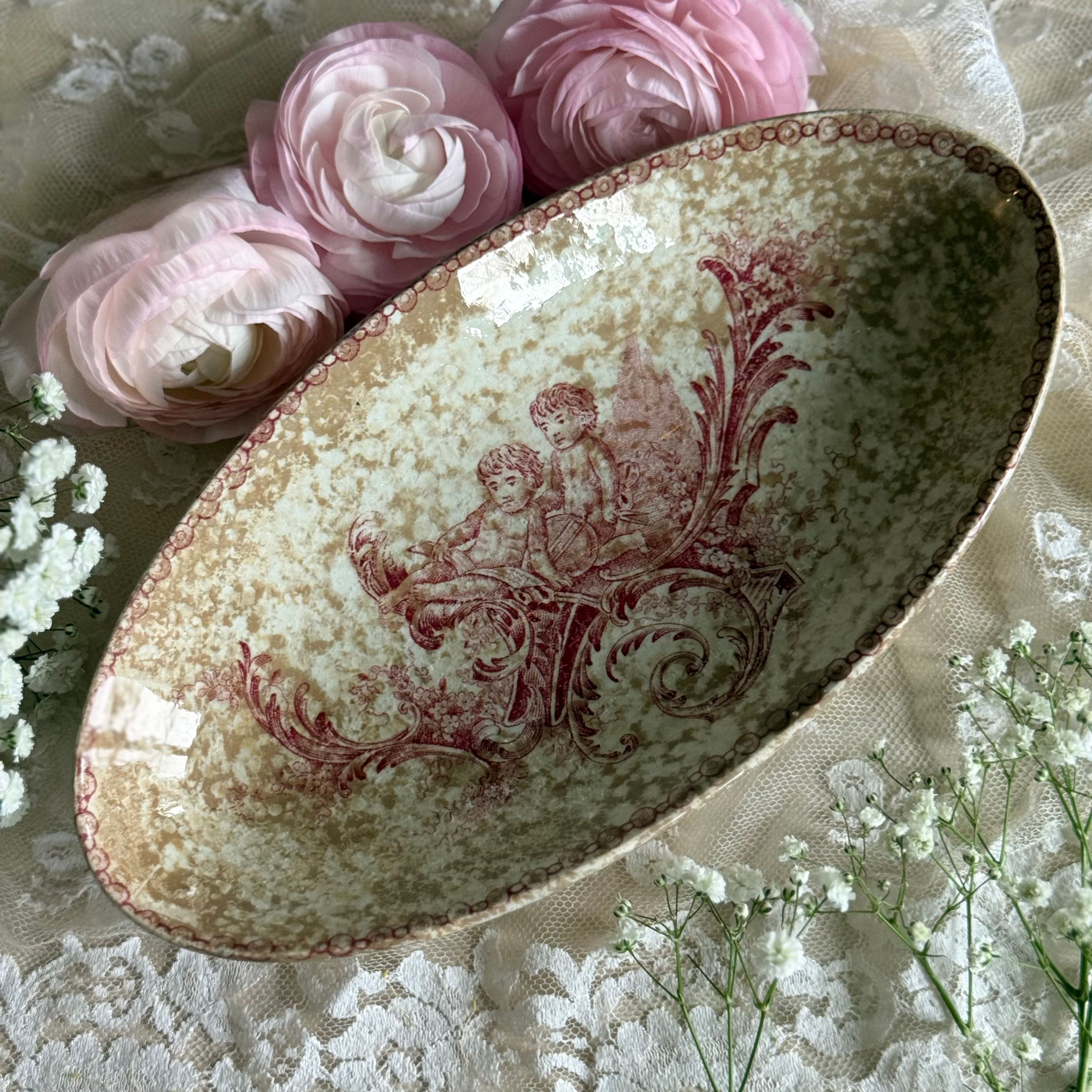 Trianon cherub pink heavily patinated ravier plate