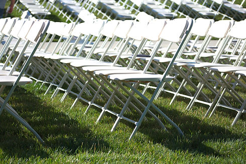 White plastic folding chairs
