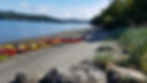 Skeg and rudder kayaks on a beach before launching on Cornet Bay Washington