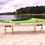 Thumbnail: Folding Kayak Stands on a beach holding a green kayak