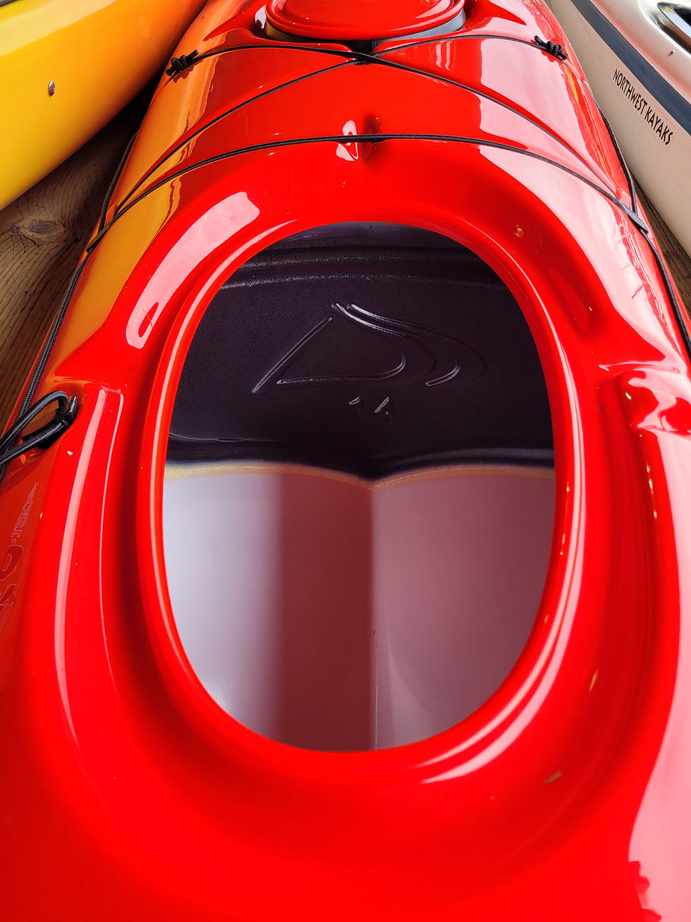 Picture of the front hatch of a thermoformed kayak showing the material the kayak is made from