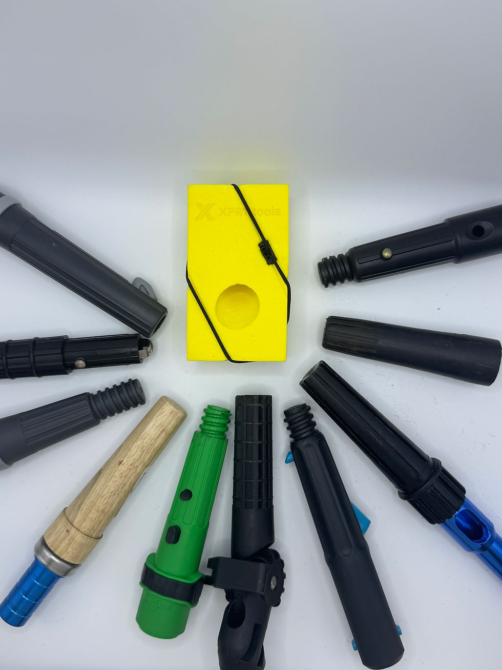 yellow brick steel wool holder showing many different pole tips that fit