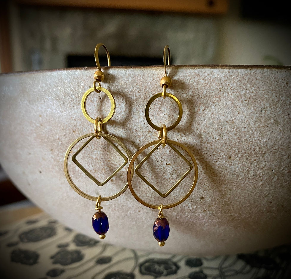 Brass earrings with blue and gold bead