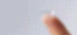 Contact lens placed on a finger