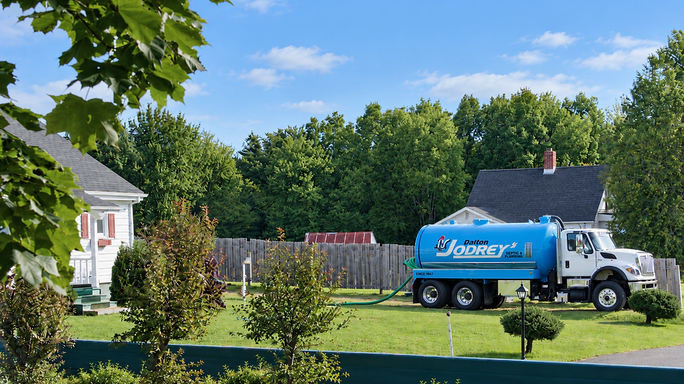 Dalton Jodrey septic pumping truck parked on site while servicing a residential septic system on Nova Scotia’s South Shore.