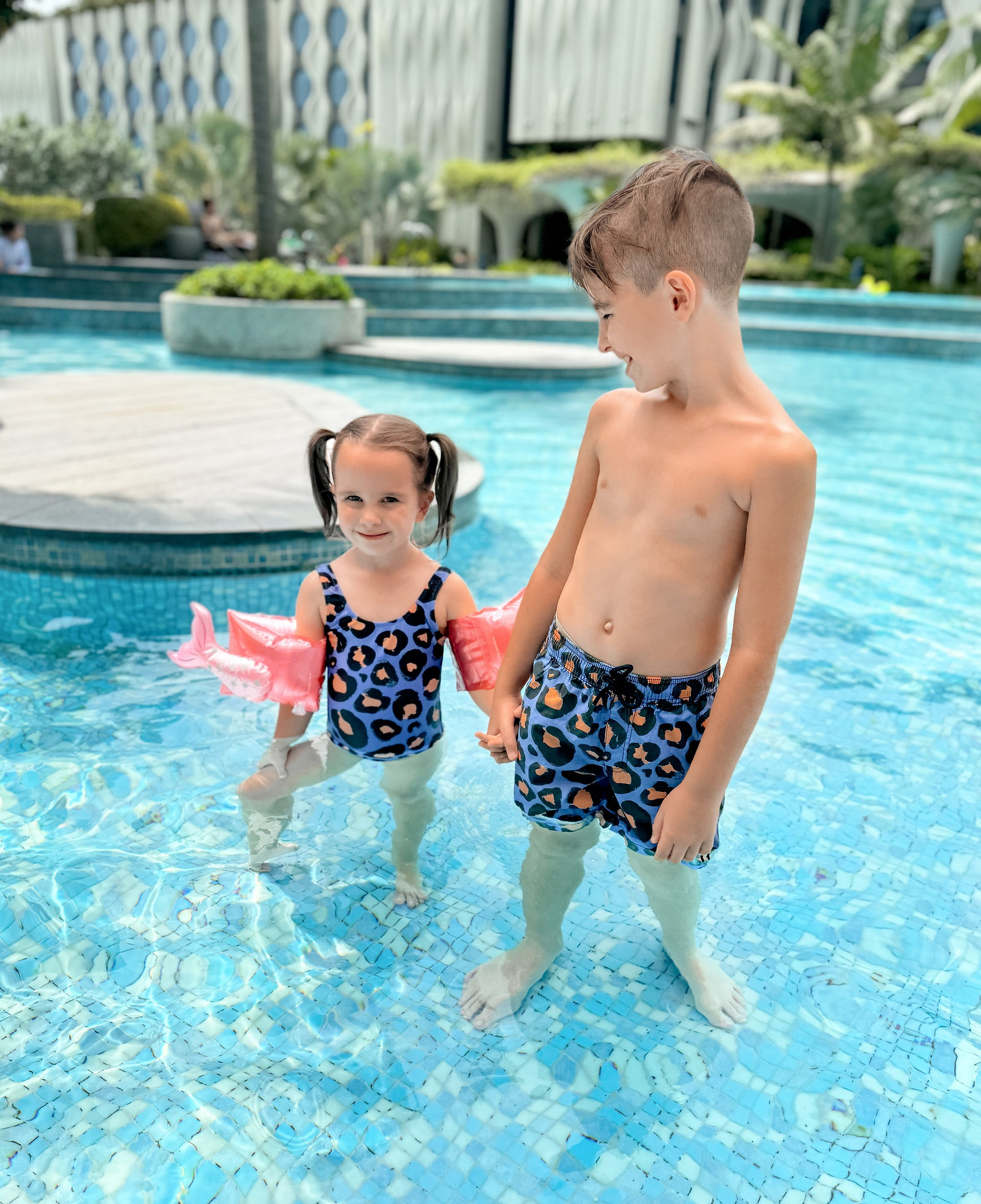 Boy and Girl in Pool at Village Hotel Sentosa