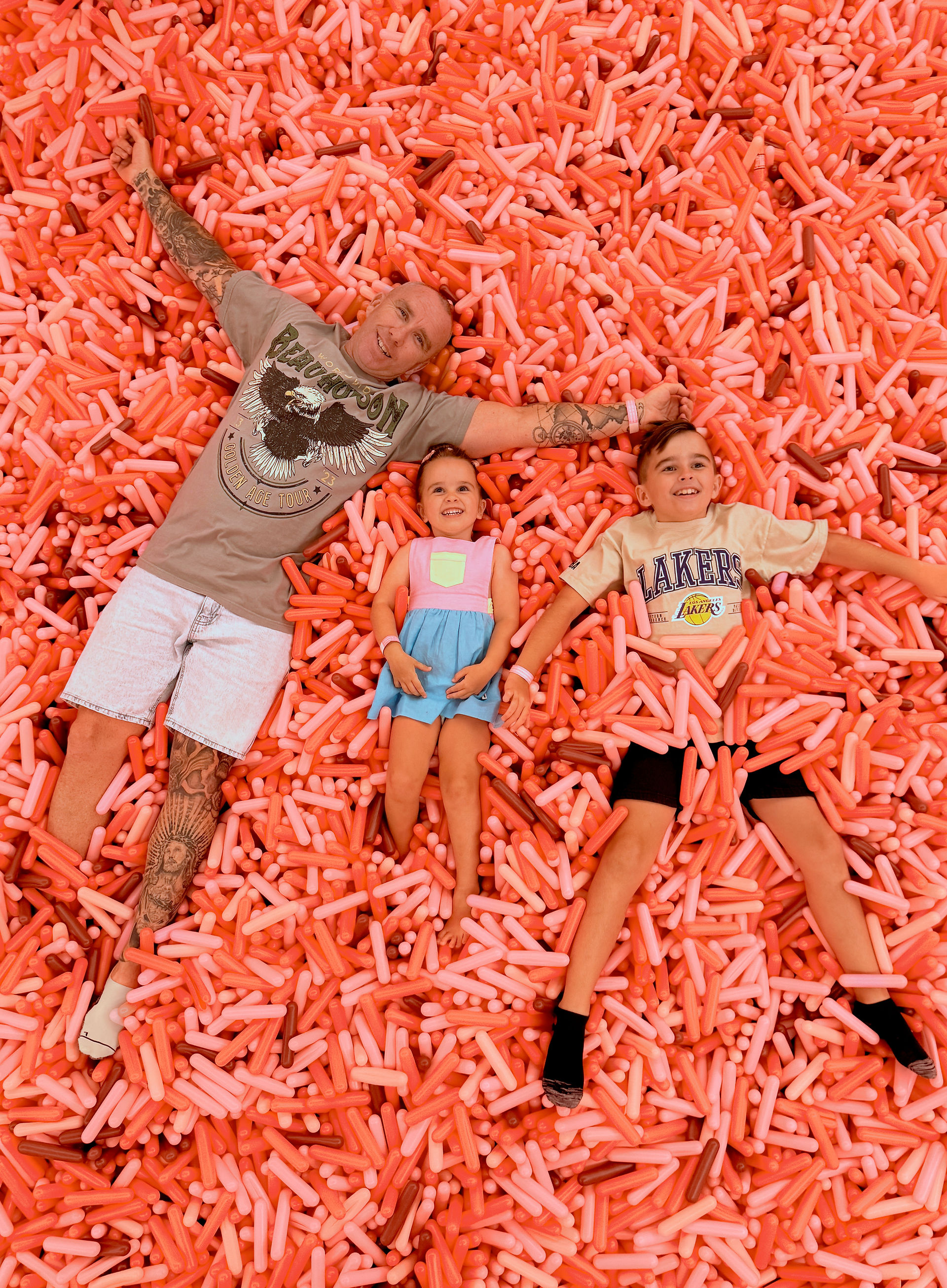 Man and Kids in Sprinkle Pool at Museum of Ice Cream