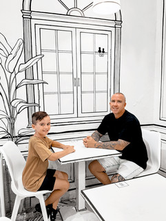 man and son at cafe monochrome