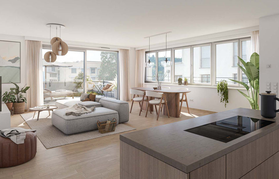 Bright living-room situation with a kitchen isle in the foreground.