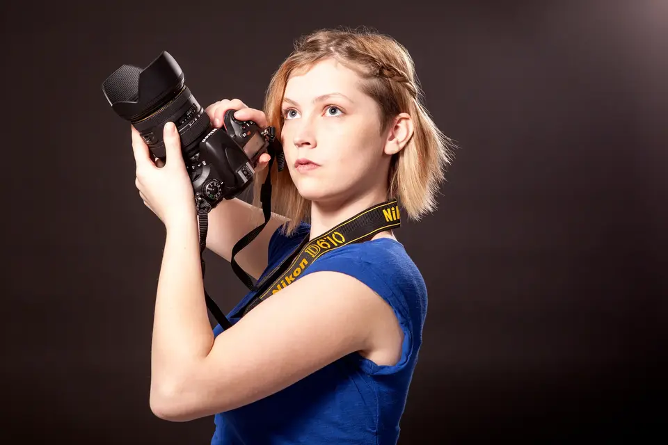 Headshot & Personal Branding Photography by Blake Ferguson depicts a head and shoulders image of a woman photographer captured in the Studio. (1)