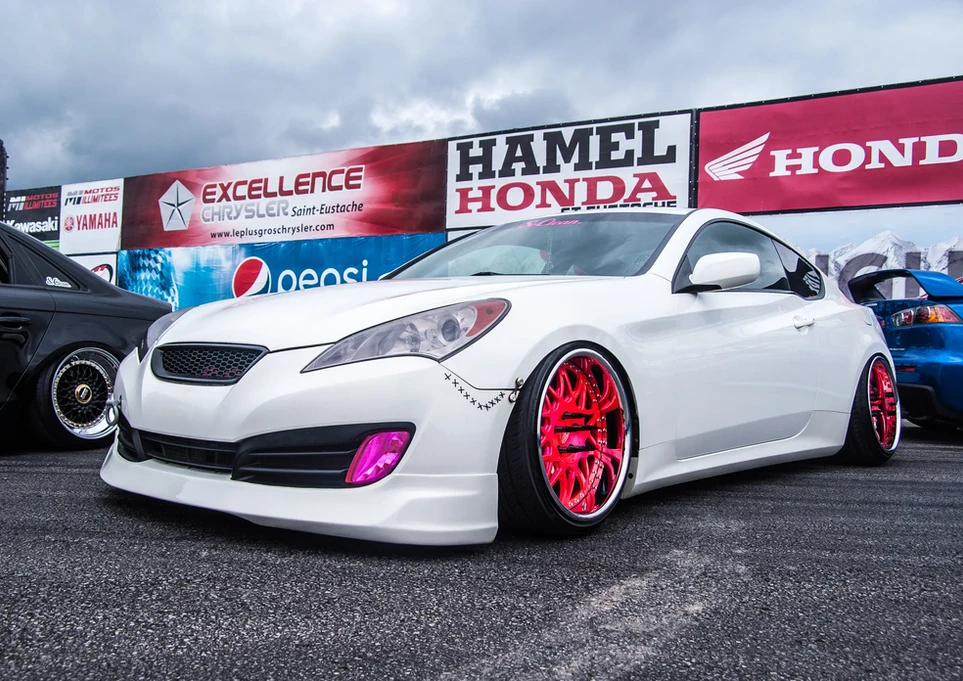 White customized Hyundai Genesis Coupe, red wheels, Hamel Honda, Pepsi.