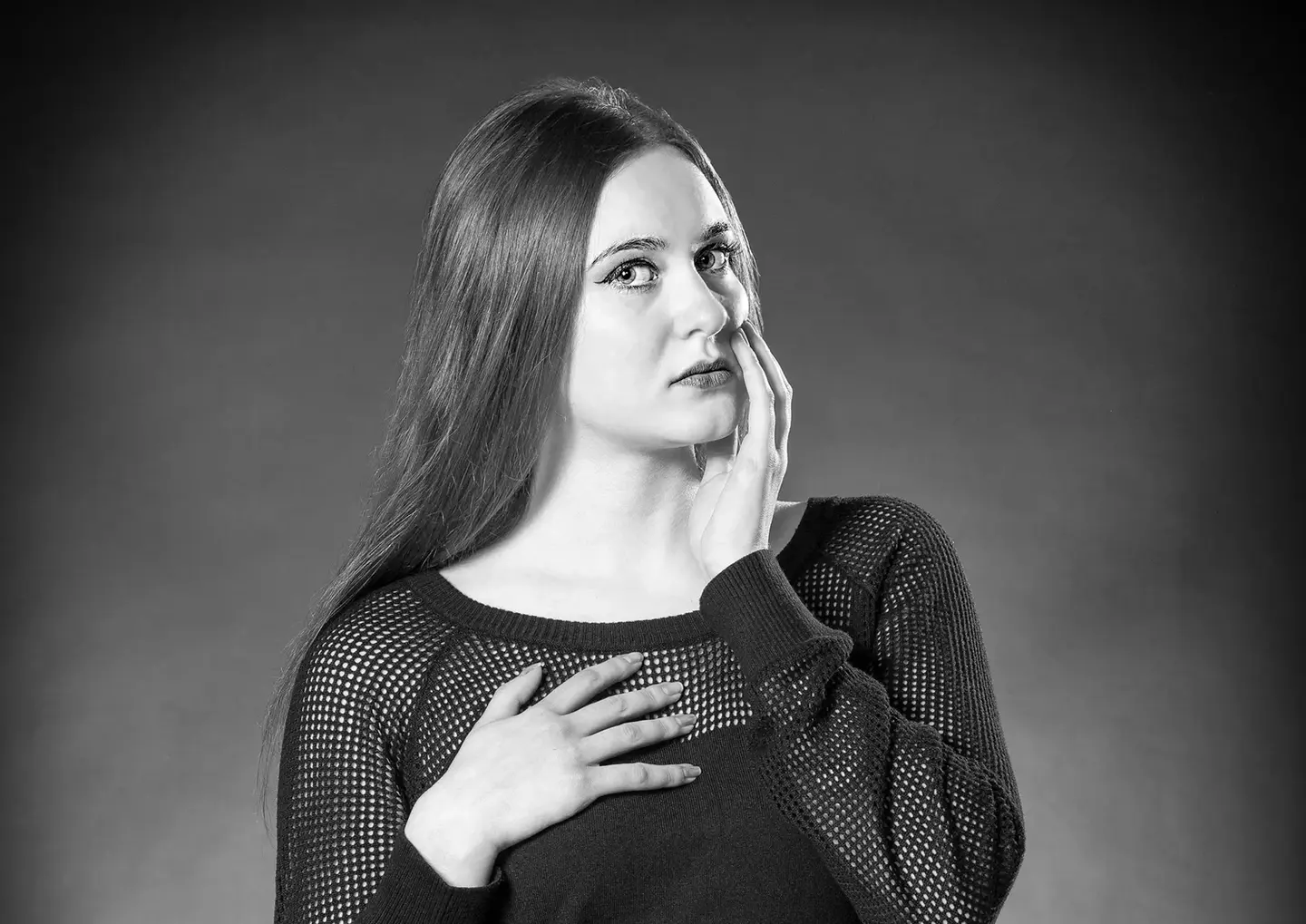 Traditional Portraiture in Monochrome by Blake Ferguson Photography depicts a full body Image of a Female Model captured in the Studio.