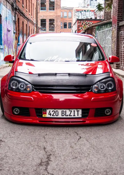Automotive Photography by Blake Ferguson depicts Kevin Pratte’s modified 2008 Volkswagen Golf MK5 in Graffiti Alley, Toronto, Ontario. (1) 