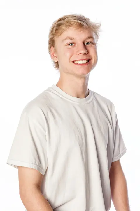 Personal Branding & Headshot Photography Services by Blake Ferguson showcases Male Model Riley Madill in a High-Key Studio Lighting setting in London, Ontario, Canada.