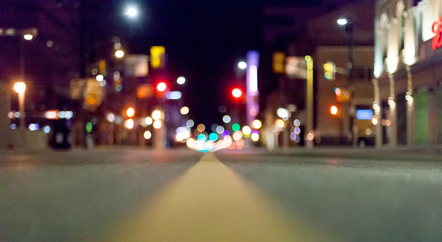 Night & Cityscape Fine-Art Photography by Blake Ferguson depicts Bokeh of Lights cast on Dundas Street West, Downtown London, Ontario, Canada.