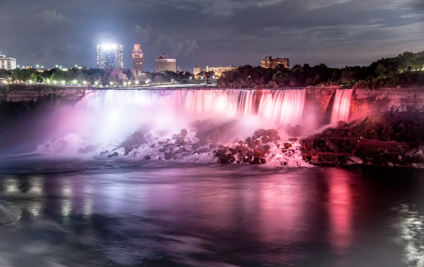 Night & Cityscape Fine-Art Photography by Blake Ferguson depicts the Niagara Falls at Night with Vibrant Lighting in Ontario, Canada.