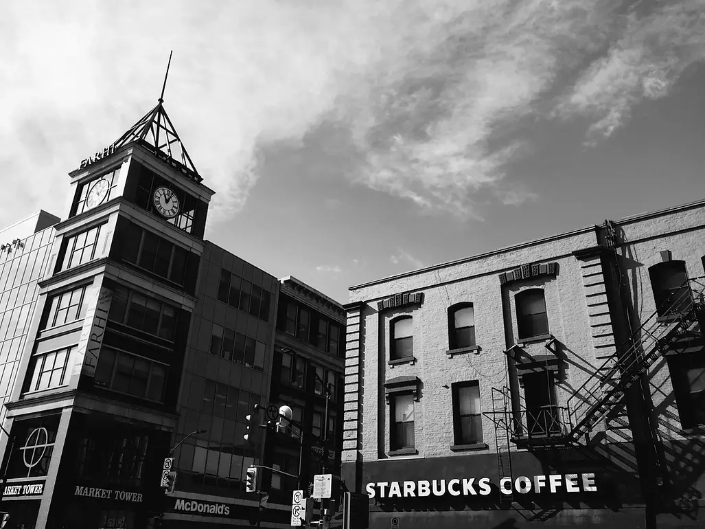 Blake Ferguson references iPhone Photography compositions from 2017, showcasing the Exterior of the Market Tower on Dundas Street, London, Ontario. 