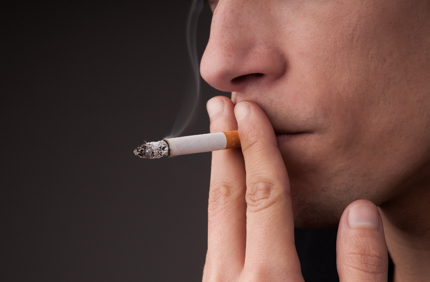 A person smoking a cigarette