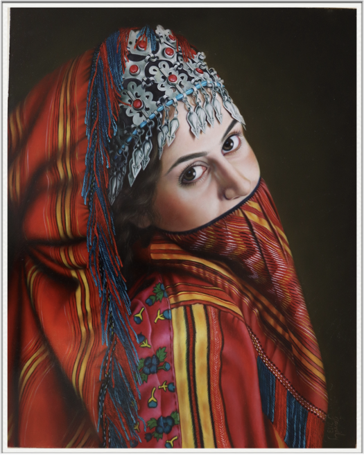 Turkmen women in Iran are considered among the most beautiful Iranian women, dedicating their entire lives to creating beauty. They weave carpets and rugs, even crafting their own clothing from silk they raise and produce. Turkmen Iranian women are like beautiful queens adorned in red attire and silver crowns. 
One of my apprentices was Turkmen, and in 2013, I painted her portrait, thoroughly enjoying the experience.