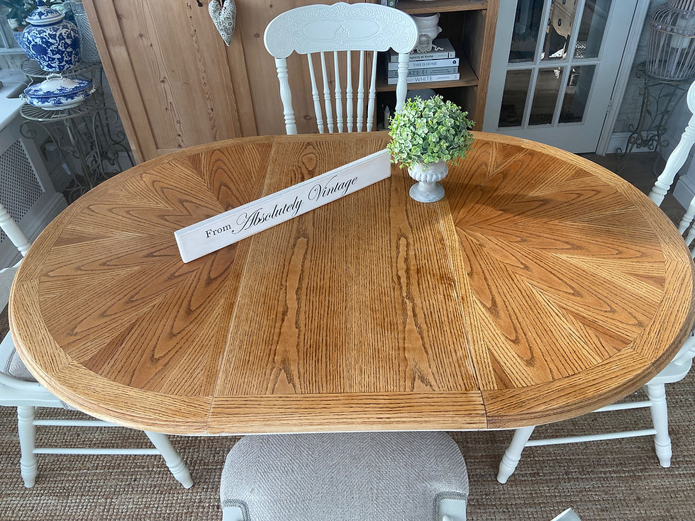 Thumbnail: A Tiger Oak Extending Dining Table and 4 Chairs 
