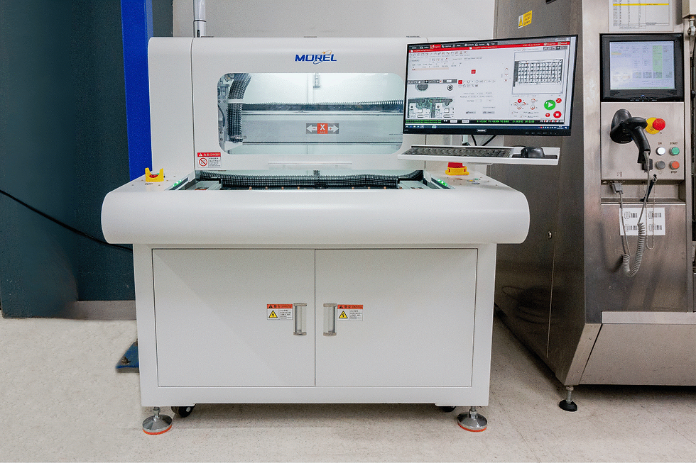 A depaneling router on a factory floor