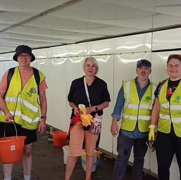 Volunteers cleaning the underpass at Forest Hill Station