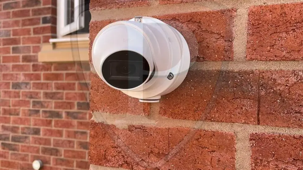 white camera system installed on a block of flat in the back country
