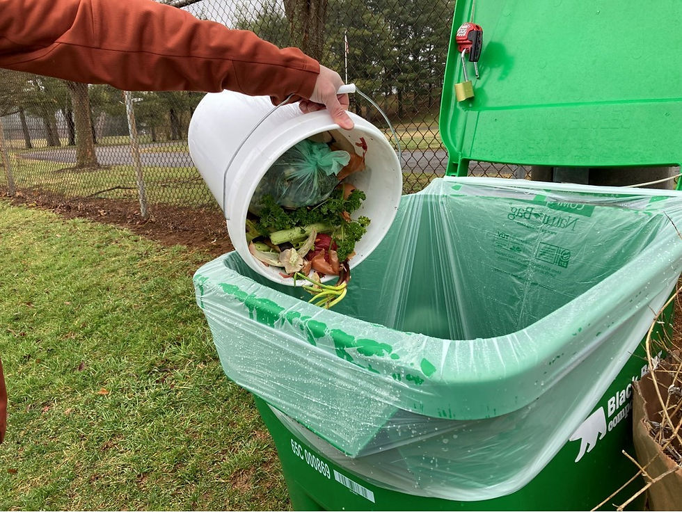 Food Scraps being put in bin.jpg