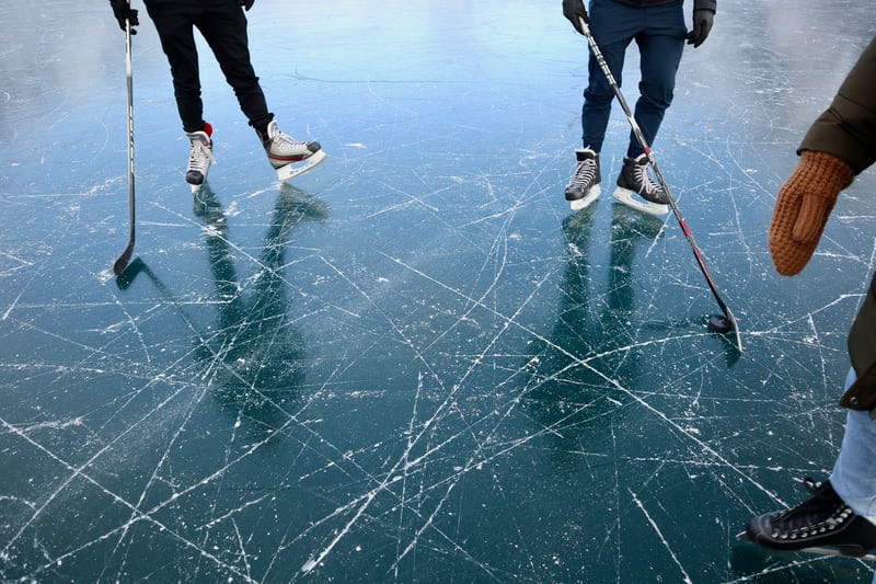skating outdoors hockey lake frozen ice