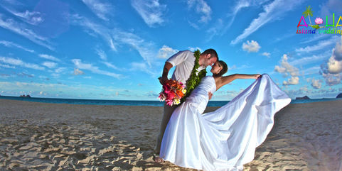Meghan Sullivan - silk blowing in the wind on a beach Hawaii wedding day