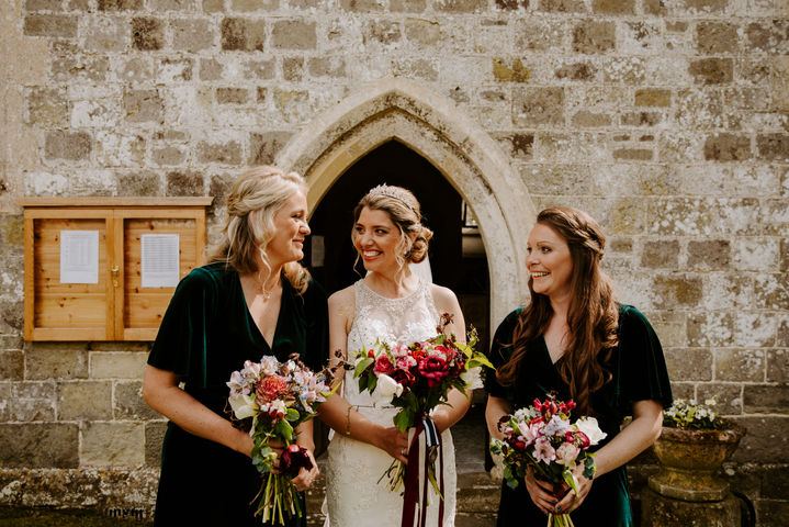 Coral with bridesmaids.JPG