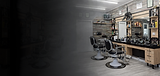 Modern barbershop interior with vintage chairs.png