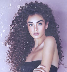 spiral permed hair