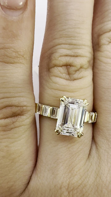 Thumbnail: 3.08 carat D VS1 emerald cut lab diamond with bar set baguette side stones 