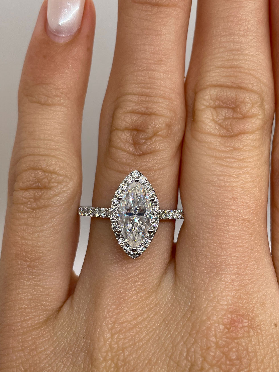 Thumbnail: 1.5 carat marquise moissanite on a pavé band with halo 