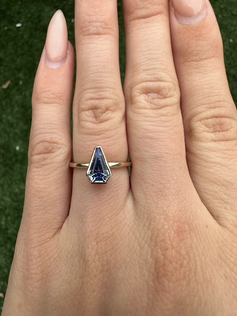Thumbnail: 1.02 carat natural kite shaped sapphire bezel solitaire 