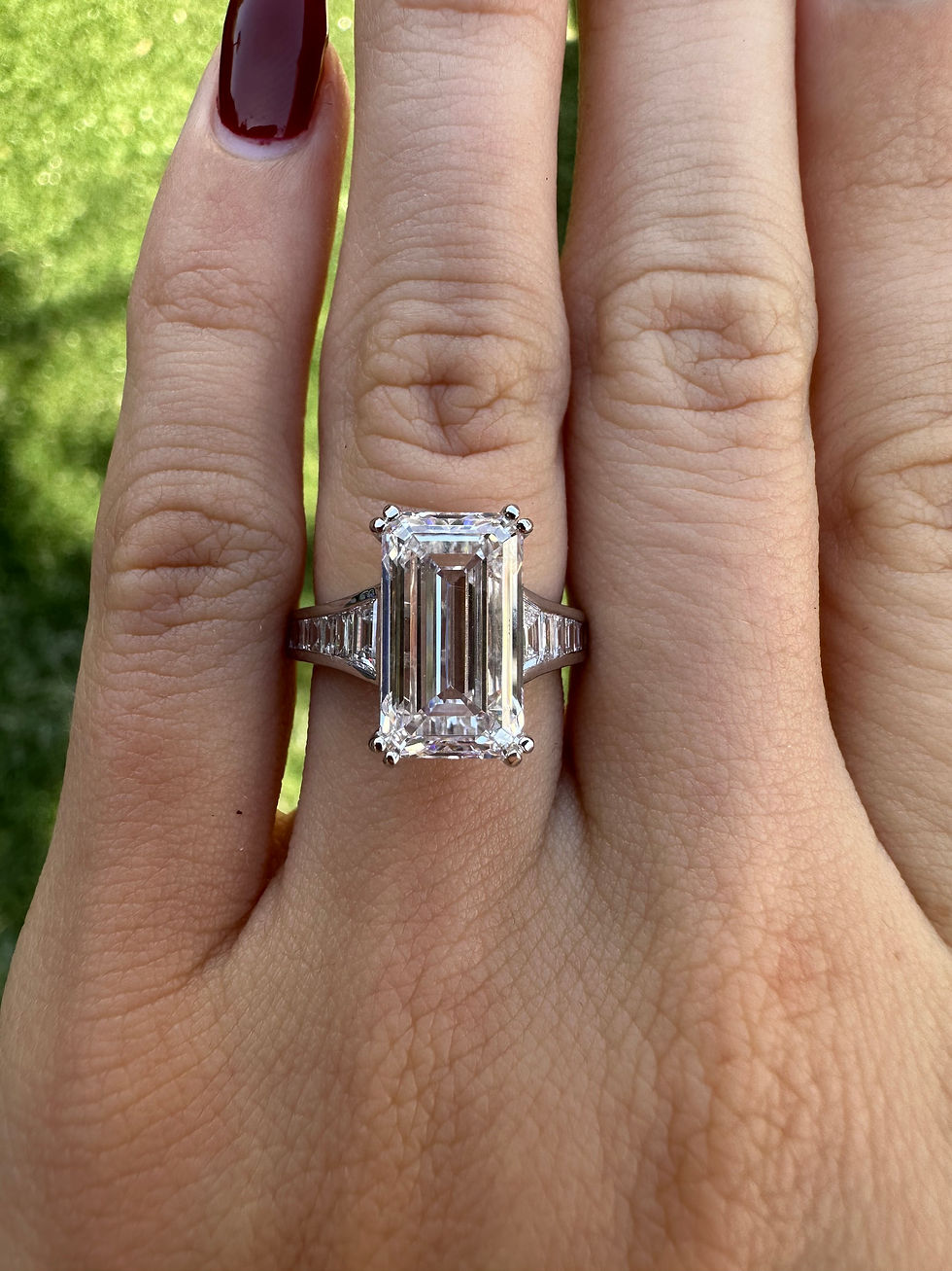 Thumbnail: 5.01 carat emerald cut lab grown diamond on a graduated baguette diamond band 