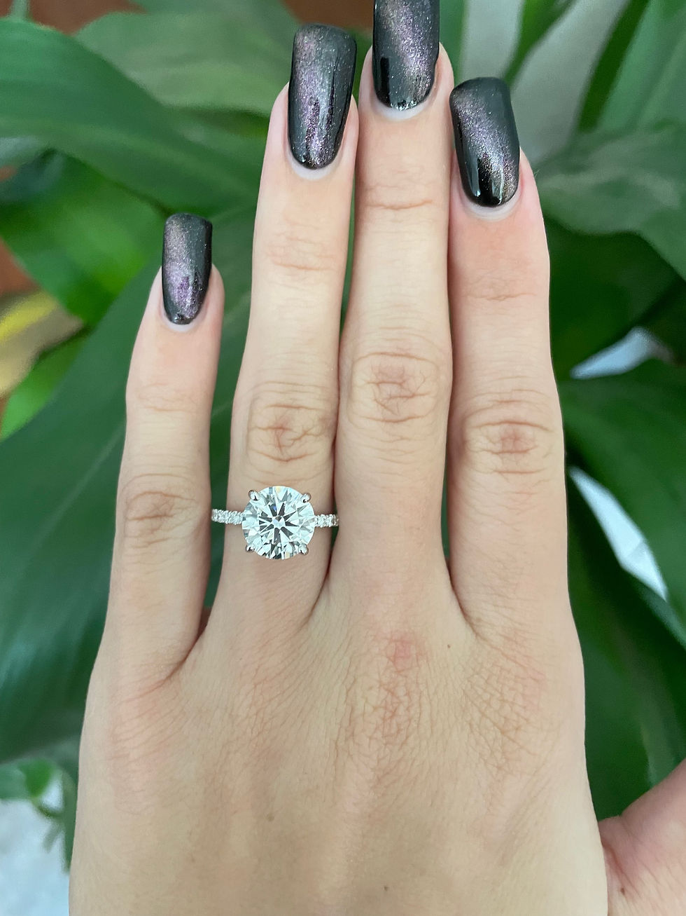 Thumbnail: 3.00 H VS1 round lab grown diamond on a pavé band 