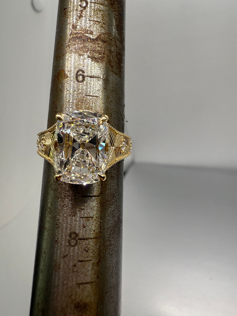 Thumbnail: 5.01 carat F VS1 antique cut cushion lab diamond engraved band 