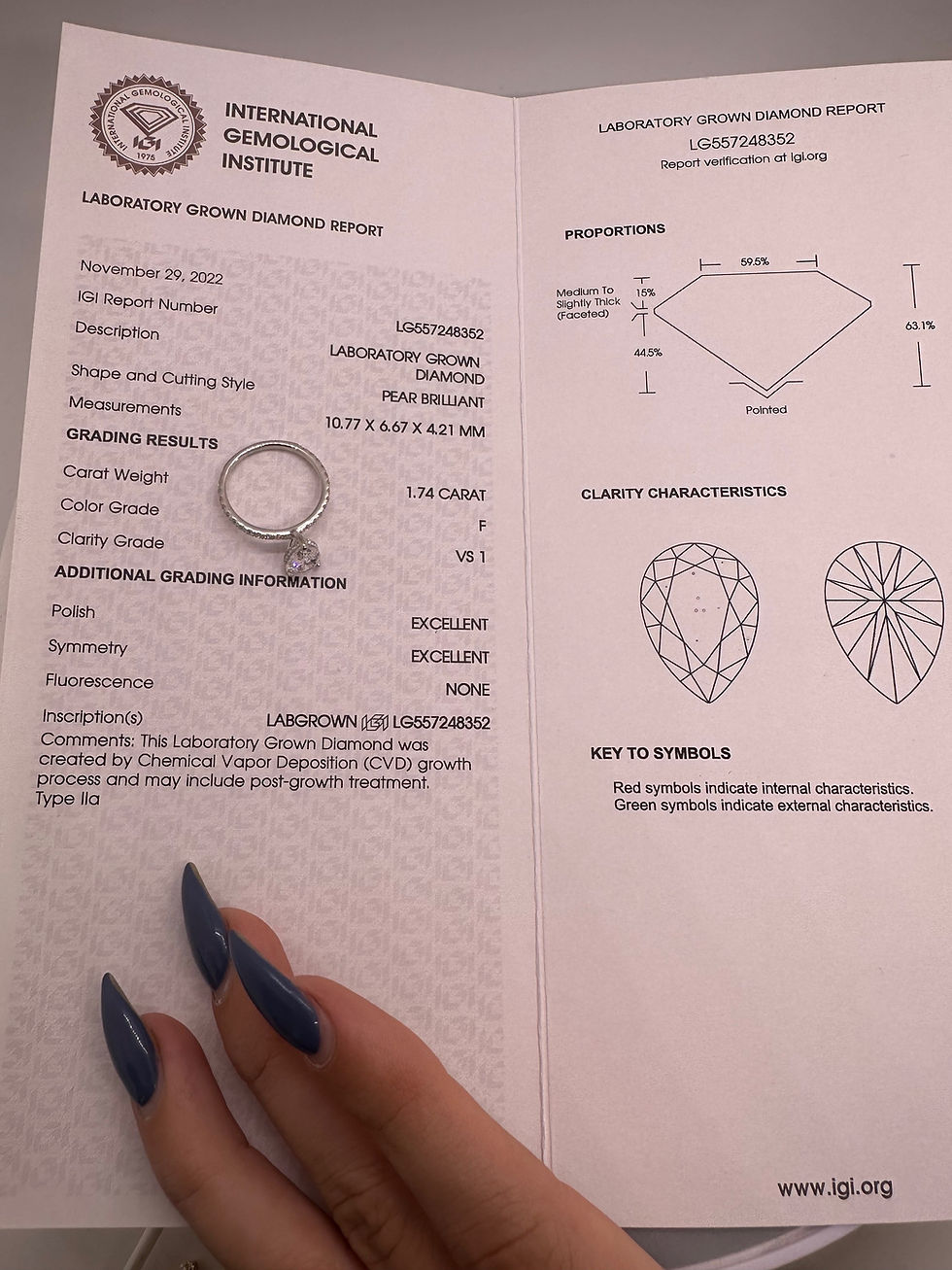 Thumbnail: 1.74 carat F VS1 pear lab diamond on a pave band 14k white gold  